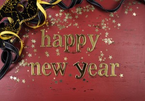 Happy New Year background on dark red vintage wood