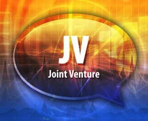 word speech bubble illustration of business acronym term JV Joint Venture