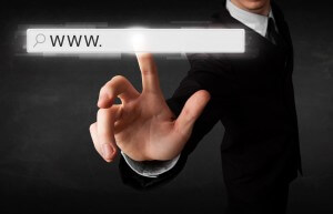 Young businessman touching web browser address bar with www sign